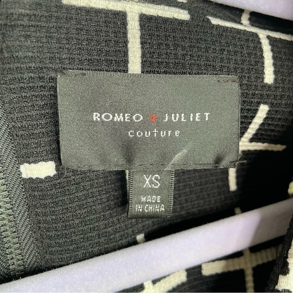 Romeo & Juliet Couture Black and White Cross Dress - Picture 5 of 6